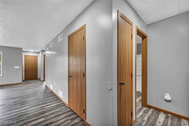 1350 Elmside St, Alliance, OH 44601 - hallway with wood finished floors and baseboards