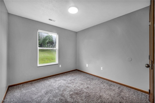 1350 Elmside St, Alliance, OH 44601 - carpeted spare room with baseboards