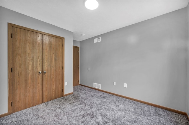 1350 Elmside St, Alliance, OH 44601 - unfurnished bedroom featuring carpet flooring and a closet