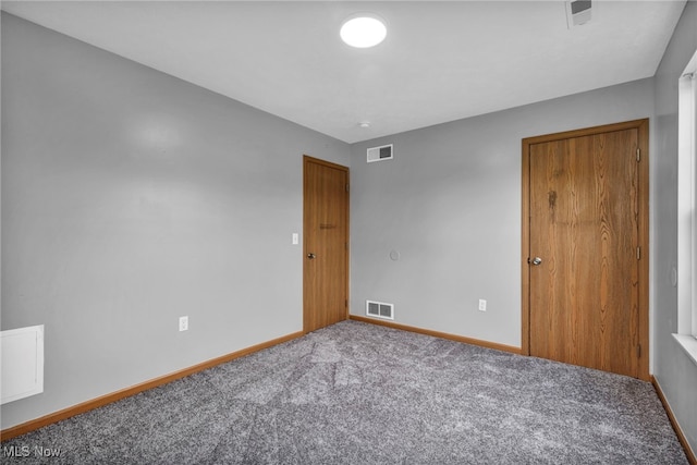 1350 Elmside St, Alliance, OH 44601 - unfurnished bedroom featuring carpet flooring and baseboards