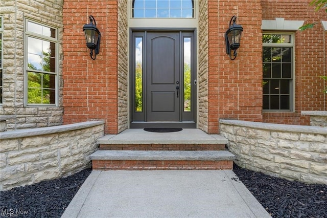 32305 Monaco Pl, Avon Lake, OH 44012 - doorway to property featuring stone siding and brick siding