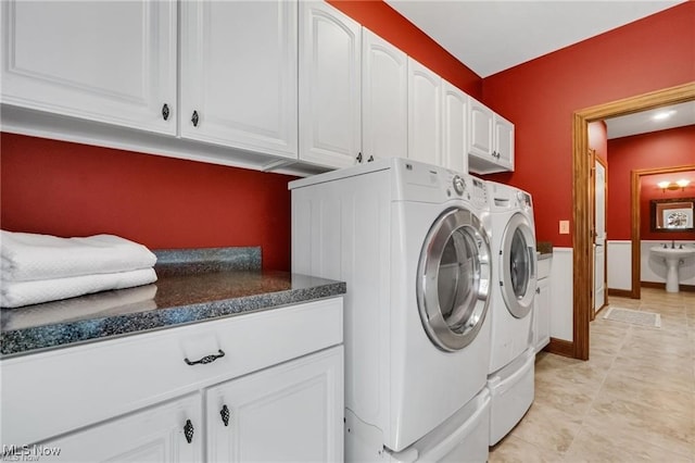 32305 Monaco Pl, Avon Lake, OH 44012 - washroom with cabinet space and washer and dryer