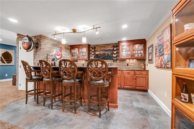 32305 Monaco Pl, Avon Lake, OH 44012 - indoor bar with tasteful backsplash, recessed lighting, and crown molding