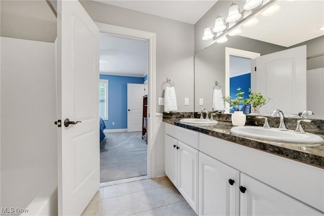 32305 Monaco Pl, Avon Lake, OH 44012 - full bathroom featuring double vanity and tile patterned floors