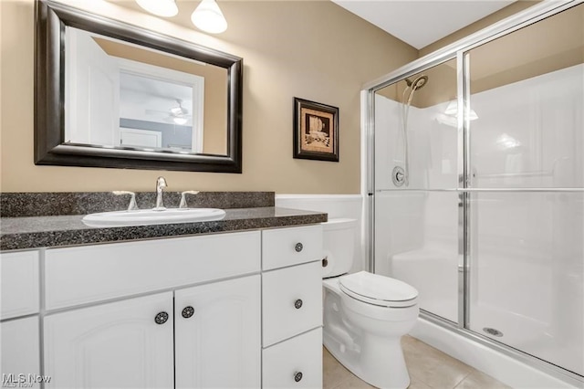 32305 Monaco Pl, Avon Lake, OH 44012 - full bathroom with vanity, a stall shower, and tile patterned floors