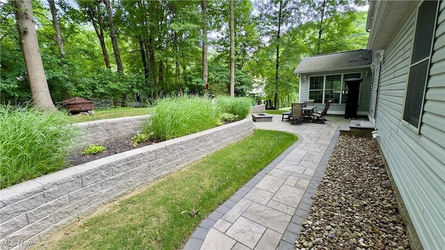 6190 3rd Ave, Kent, OH 44240 - view of yard featuring a patio area and an outdoor fire pit