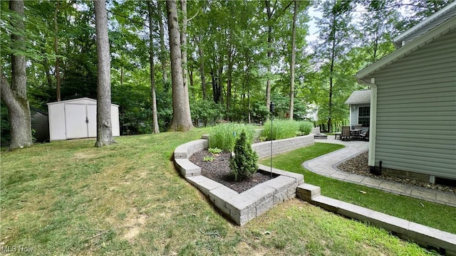 6190 3rd Ave, Kent, OH 44240 - view of grassy yard featuring a patio and a storage shed