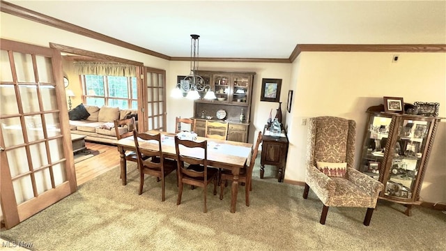 6190 3rd Ave, Kent, OH 44240 - carpeted dining area featuring ornamental molding