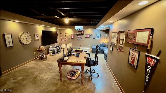 6190 3rd Ave, Kent, OH 44240 - home office with concrete floors and a baseboard radiator