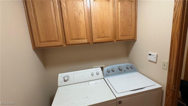 6190 3rd Ave, Kent, OH 44240 - laundry room featuring separate washer and dryer and cabinet space