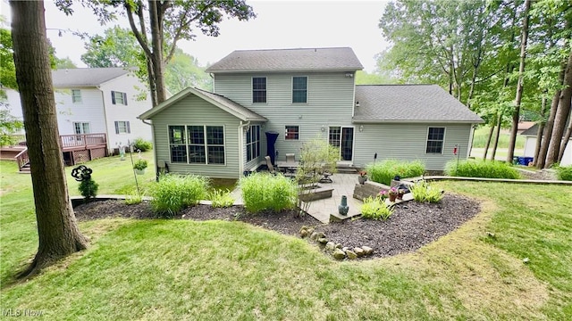 6190 3rd Ave, Kent, OH 44240 - back of house featuring a yard and a patio