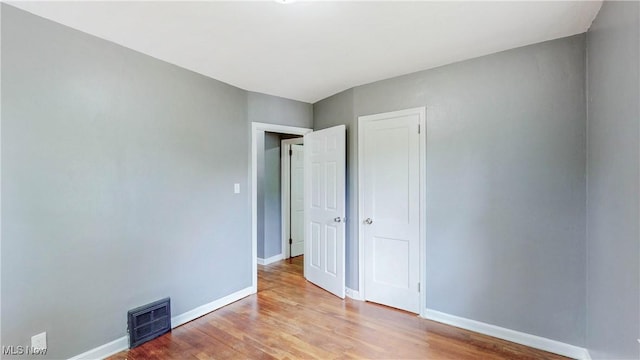 1672 Battery B St, Akron, OH 44305 - spare room featuring wood finished floors
