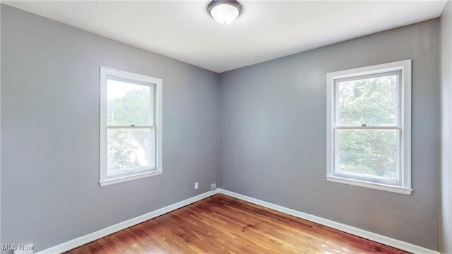 1672 Battery B St, Akron, OH 44305 - unfurnished room with plenty of natural light and wood finished floors