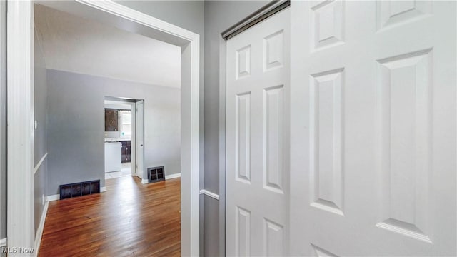 1672 Battery B St, Akron, OH 44305 - corridor with dark wood-style flooring and baseboards