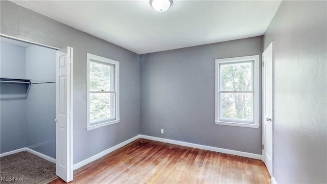 1672 Battery B St, Akron, OH 44305 - unfurnished bedroom featuring a closet and wood finished floors