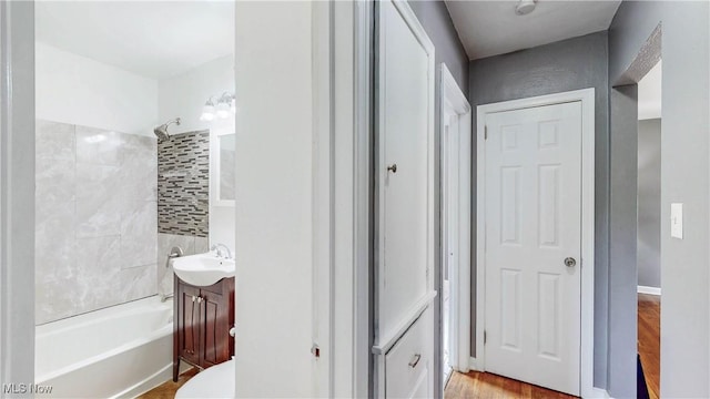 1672 Battery B St, Akron, OH 44305 - full bathroom featuring vanity, bathtub / shower combination, and wood finished floors