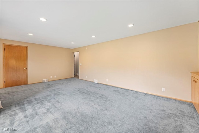 6767 Chippewa Ave NW, North Canton, OH 44720 - spare room with recessed lighting and light colored carpet