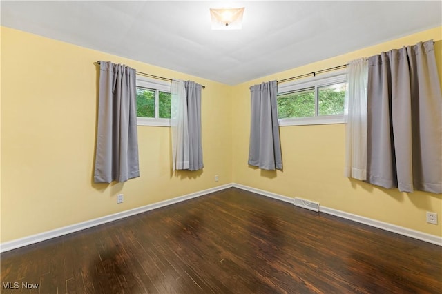6767 Chippewa Ave NW, North Canton, OH 44720 - spare room with baseboards and wood finished floors