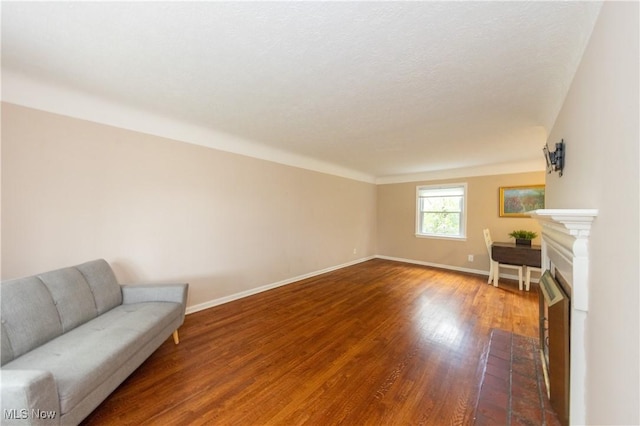 29504 Cresthaven Dr, Willowick, OH 44095 - living room with wood finished floors and a fireplace with flush hearth
