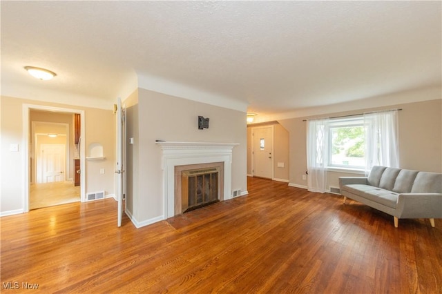29504 Cresthaven Dr, Willowick, OH 44095 - living room featuring light wood-style floors and a fireplace