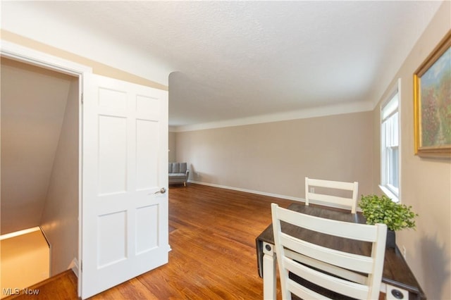 29504 Cresthaven Dr, Willowick, OH 44095 - unfurnished dining area featuring wood finished floors and baseboards