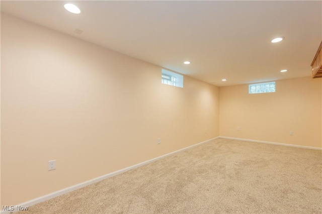 29504 Cresthaven Dr, Willowick, OH 44095 - below grade area with recessed lighting, light colored carpet, and plenty of natural light