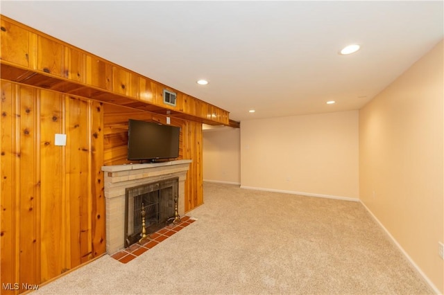 29504 Cresthaven Dr, Willowick, OH 44095 - unfurnished living room featuring light colored carpet, recessed lighting, and a tile fireplace