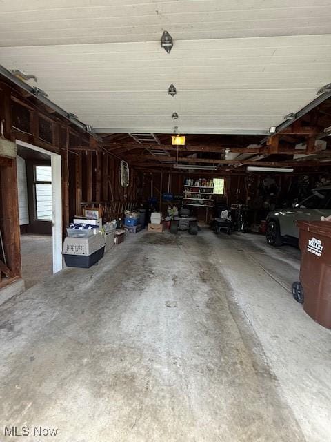 5783 Eagle Creek Rd, Leavittsburg, OH 44430 - garage featuring a garage door opener