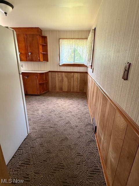 5783 Eagle Creek Rd, Leavittsburg, OH 44430 - corridor featuring light colored carpet and wooden walls