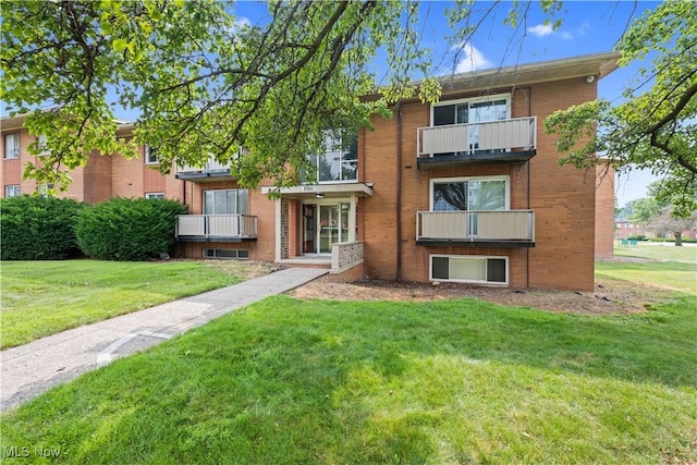 21881 River Oaks Dr Unit C4, Rocky River, OH 44116 - view of front of house featuring brick siding and a front yard