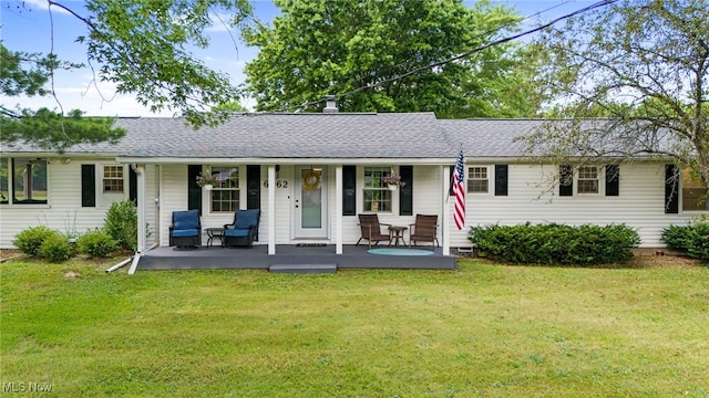 6062 Trask Rd, Thompson, OH 44086 - ranch-style house with a porch, a front lawn, and a shingled roof