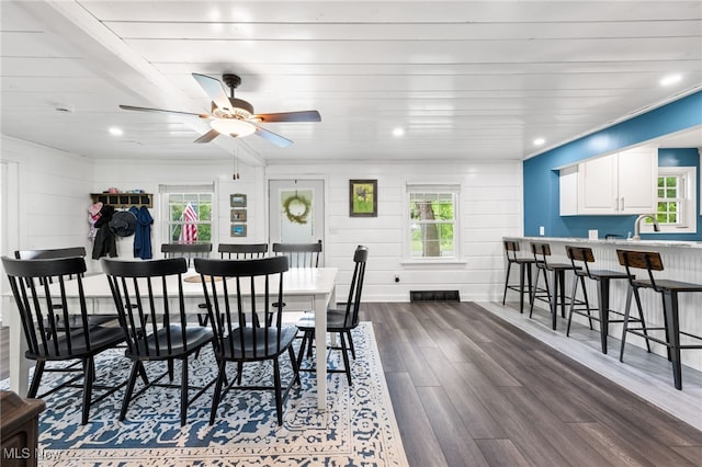 6062 Trask Rd, Thompson, OH 44086 - dining area with dark wood-style flooring, healthy amount of natural light, ornamental molding, ceiling fan, and recessed lighting