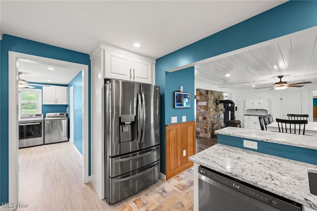 6062 Trask Rd, Thompson, OH 44086 - kitchen featuring stainless steel refrigerator with ice dispenser, a ceiling fan, dishwasher, washer and dryer, and light wood-style flooring