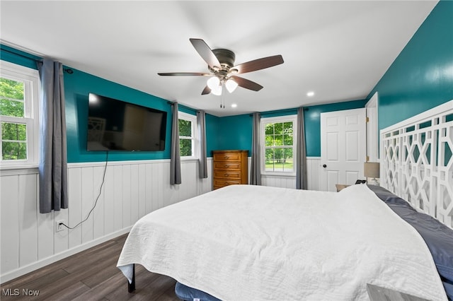 6062 Trask Rd, Thompson, OH 44086 - bedroom featuring dark wood finished floors, wainscoting, and ceiling fan