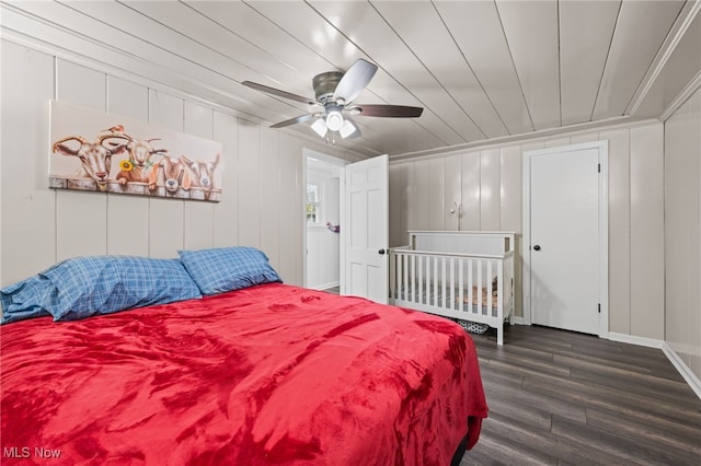6062 Trask Rd, Thompson, OH 44086 - bedroom with dark wood-style flooring, ceiling fan, and wood ceiling