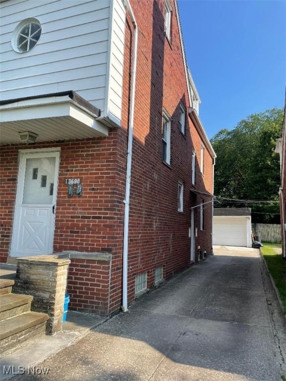 13698 Cedar, University Heights, OH 44118 - view of property exterior featuring brick siding