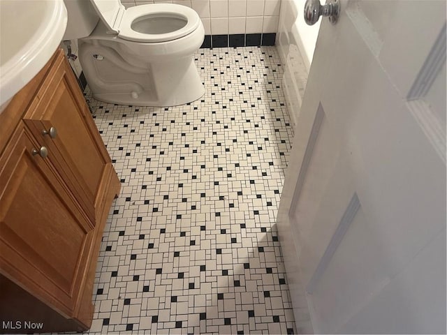 13698 Cedar, University Heights, OH 44118 - bathroom featuring vanity, tile patterned floors, and a tub to relax in