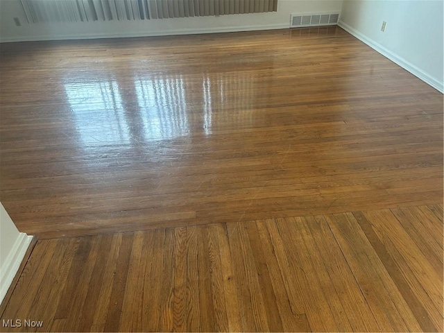 13698 Cedar, University Heights, OH 44118 - detailed view of wood finished floors and baseboards