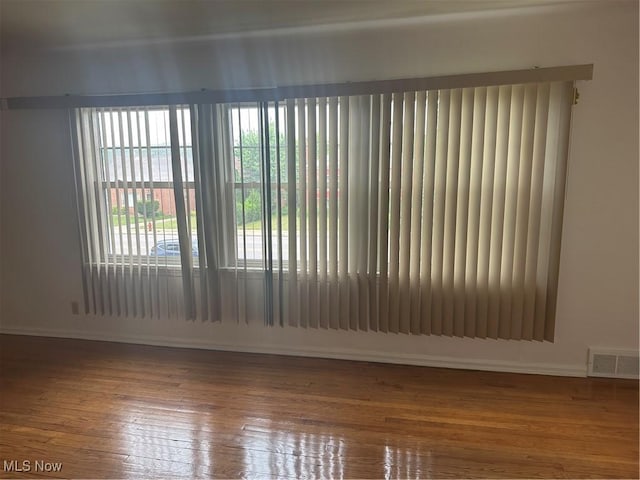 13698 Cedar, University Heights, OH 44118 - unfurnished room featuring baseboards and wood finished floors