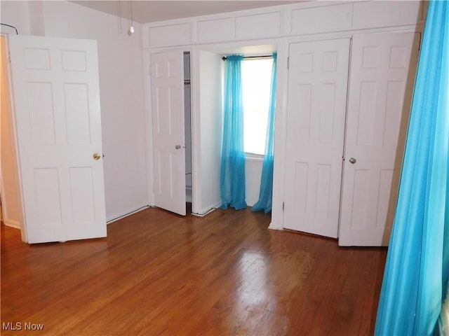 13698 Cedar, University Heights, OH 44118 - unfurnished bedroom with wood finished floors