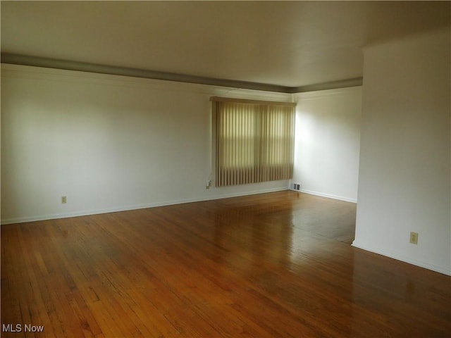 13698 Cedar, University Heights, OH 44118 - spare room with hardwood / wood-style floors and baseboards