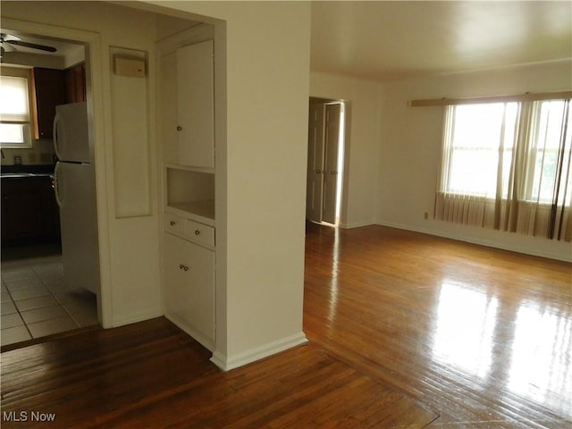 13698 Cedar, University Heights, OH 44118 - unfurnished room featuring wood finished floors, healthy amount of natural light, and ceiling fan