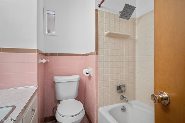 4031 Suffolk Rd, South Euclid, OH 44121 - full bathroom featuring bathtub / shower combination, vanity, and tile walls