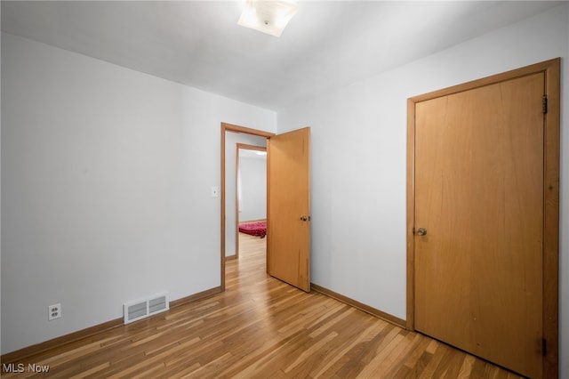 4031 Suffolk Rd, South Euclid, OH 44121 - unfurnished bedroom with light wood-style flooring and baseboards