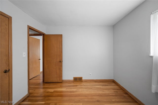 4031 Suffolk Rd, South Euclid, OH 44121 - unfurnished room featuring wood finished floors and baseboards