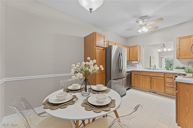33972 Honeysuckle Ln, North Ridgeville, OH 44039 - kitchen featuring stainless steel appliances, ceiling fan, and light countertops