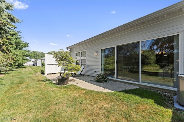 33972 Honeysuckle Ln, North Ridgeville, OH 44039 - view of green lawn with a patio area