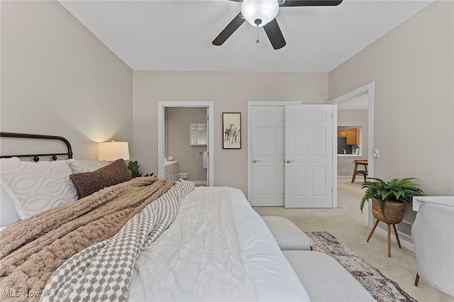 33972 Honeysuckle Ln, North Ridgeville, OH 44039 - bedroom with light colored carpet, ensuite bathroom, and a ceiling fan