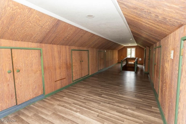 4011 Lancaster Rd, South Euclid, OH 44121 - bonus room with lofted ceiling, wooden walls, and wood finished floors