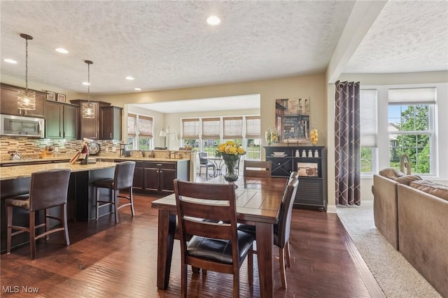 685 Shannon Pl, Aurora, OH 44202 - dining room featuring a textured ceiling, recessed lighting, and dark wood-style flooring